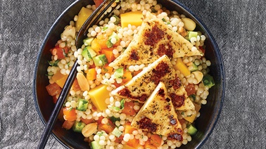Pearled couscous salad with herbs and grilled cheese
