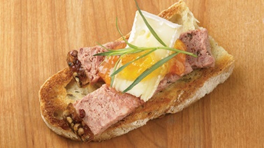 Country-style pâté, Camembert, and peach jam crostini