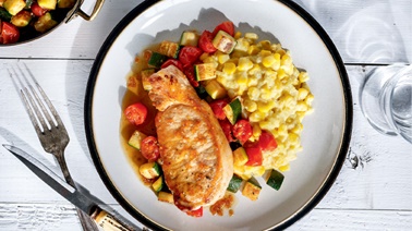 Pork Chops with Creamed Corn and Cherry Tomatoes from Ricardo