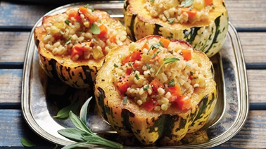Squash with barley, pancetta, and two-cheese stuffing