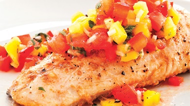 Walleye fillets with crushed tomatoes and mango