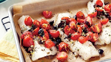Grilled haddock with capers, olives, and tomatoes
