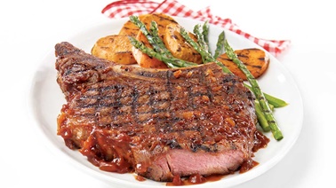 Prime rib steak with black beer barbecue sauce