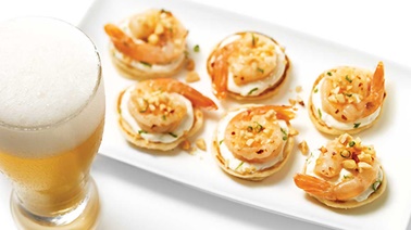 Sweet and sour blinis with shrimp