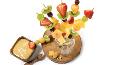Fruit skewers with maple sauce