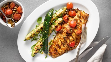 Grilled striped bass with cherry tomatoes and capers from Stefano Faita