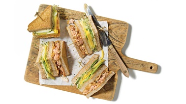 Two-salmon club sandwich
