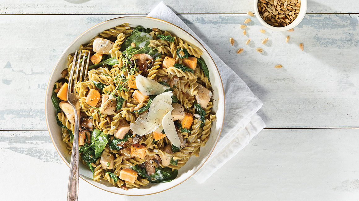Fusilli with roasted squash, chicken, sunflower seeds, and mushrooms
