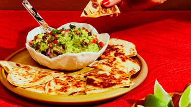 Guacamole With Black Bean And Tomato On Cheese Quesadillas