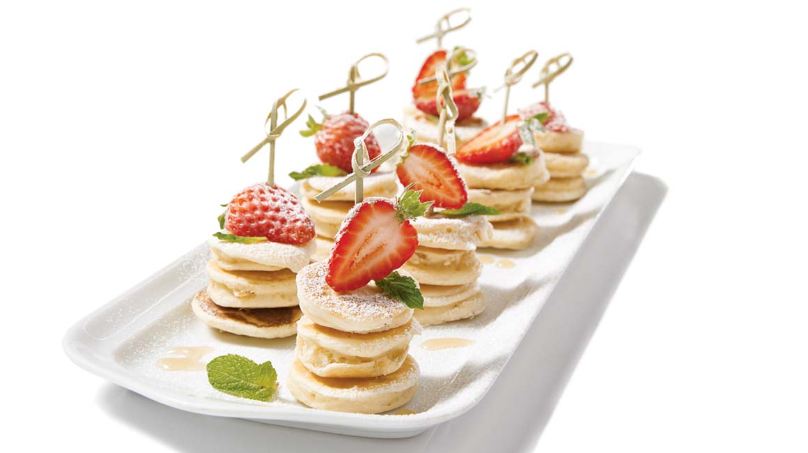 Mini pancakes with strawberries