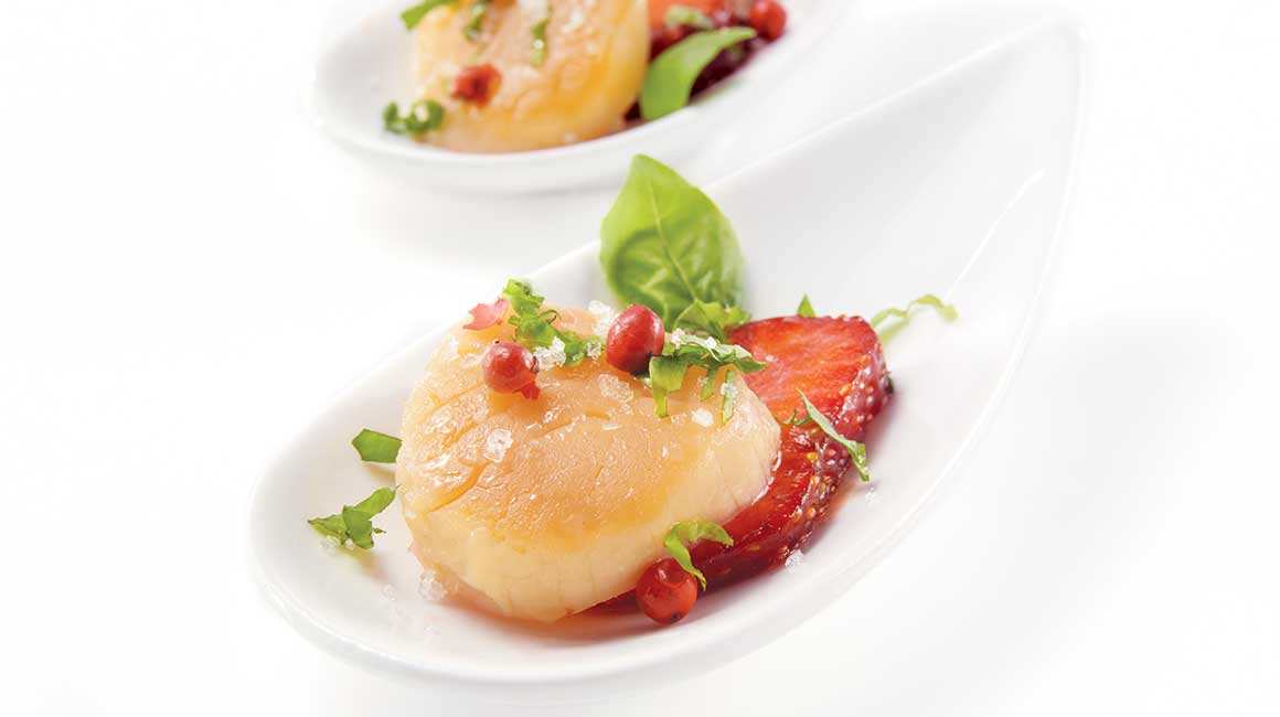 Smoked scallops with strawberries, basil, and pink pepper