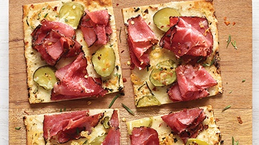 Thin crust pizza with smoked meat