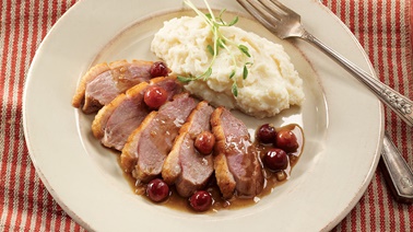 Pan-fried duck breasts with roasted grapes from Josée di Stasio