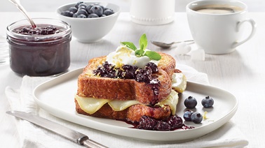 Pain Dore French Toast Grilled cheese Sandwich featuring Maple Oka Cheese with Blueberry Compote