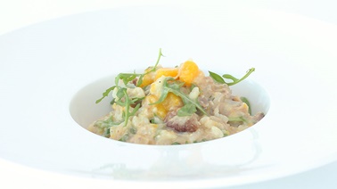Pork osso buco risotto with roasted squash and goat cheese