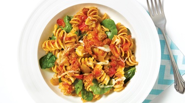 Rotini with meat sauce, spinach, and cheese