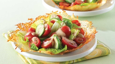 Tomato and cucumber salad in Parmesan bowls