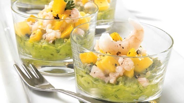 Shrimp and mango salsa over guacamole