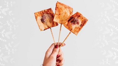 Deep-fried goat cheese on a stick from Trois fois par jour