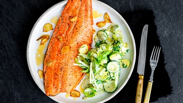 Oil-Roasted Trout & Golden Garlic Chips with Creamy Brussels Sprout, Zucchini & Apple Salad