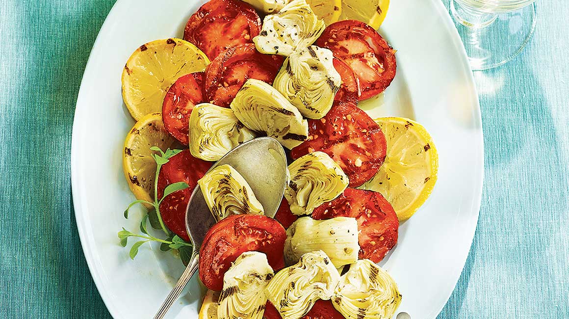 Grilled tomatoes, artichokes, and lemons