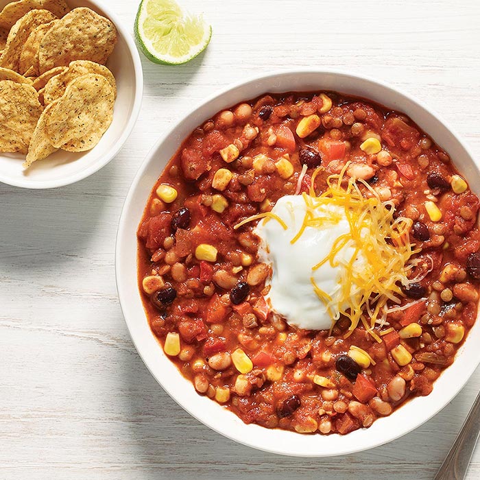 Vegetarian Chili + cheese + sour cream + chips